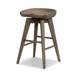 A fresh spin on bar seating, the parawood Paramore Swivel Counter Stool is finished in a deep charcoal for a clean, sleek look. The stool is topped with a swivel. Amethyst Home provides interior design, new home construction design consulting, vintage area rugs, and lighting in the Miami metro area.