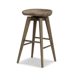 A fresh spin on bar seating, the parawood Paramore Swivel Counter Stool is finished in a deep charcoal for a clean, sleek look. The stool is topped with a swivel. Amethyst Home provides interior design, new home construction design consulting, vintage area rugs, and lighting in the Newport Beach metro area.