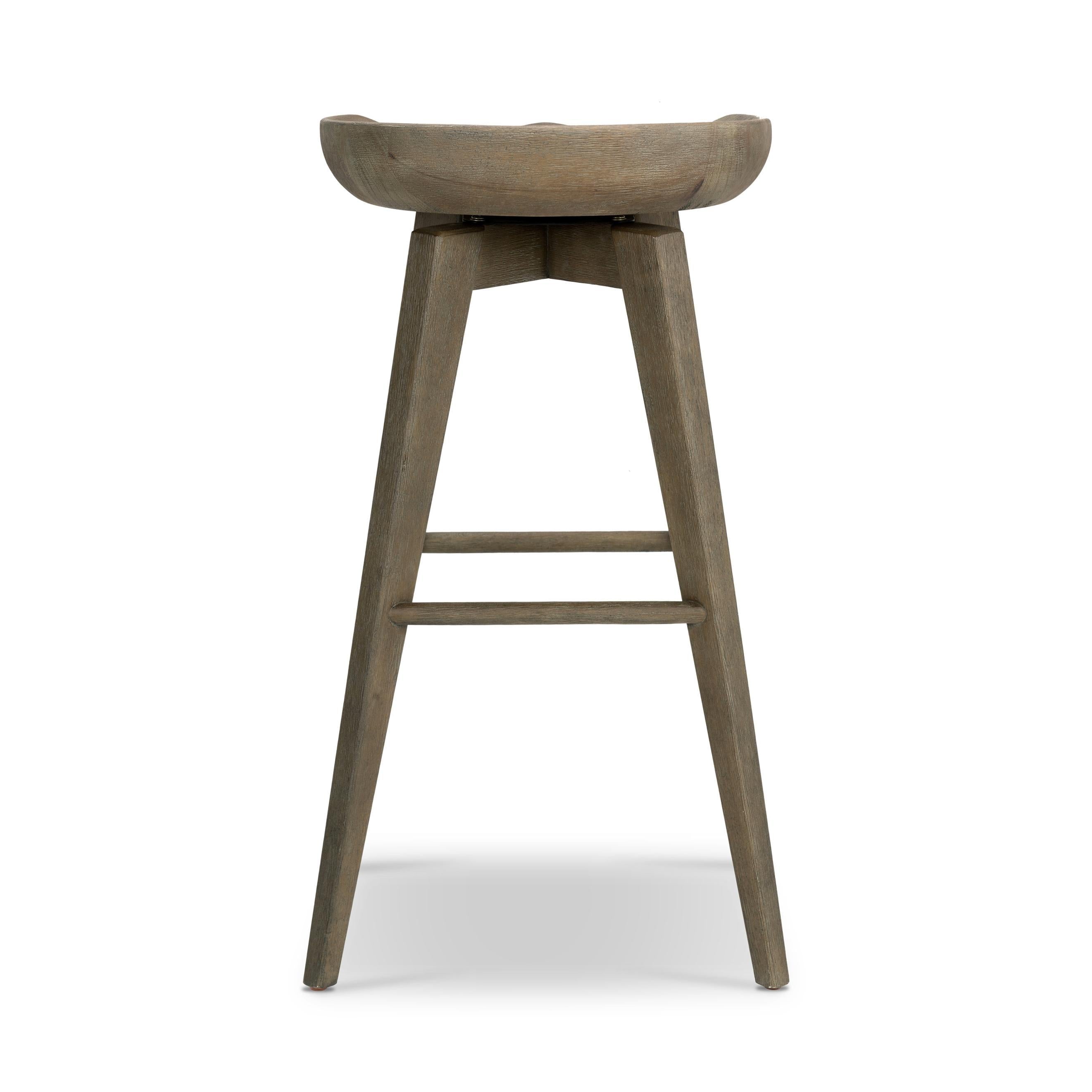 A fresh spin on bar seating, the parawood Paramore Swivel Counter Stool is finished in a deep charcoal for a clean, sleek look. The stool is topped with a swivel. Amethyst Home provides interior design, new home construction design consulting, vintage area rugs, and lighting in the Portland metro area.