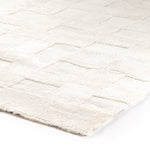 Patchwork Cream Shorn Shearling Rug is shaved to different heights and stitched together to create a tonal checked pattern for a modern yet classic look. Subtle color variations bring a natural, more organic feel to the rug. The material, pattern, and hues come together to craft an unexpected bold style. Amethyst Home provides interior design services, furniture, rugs, and lighting in Omaha area.