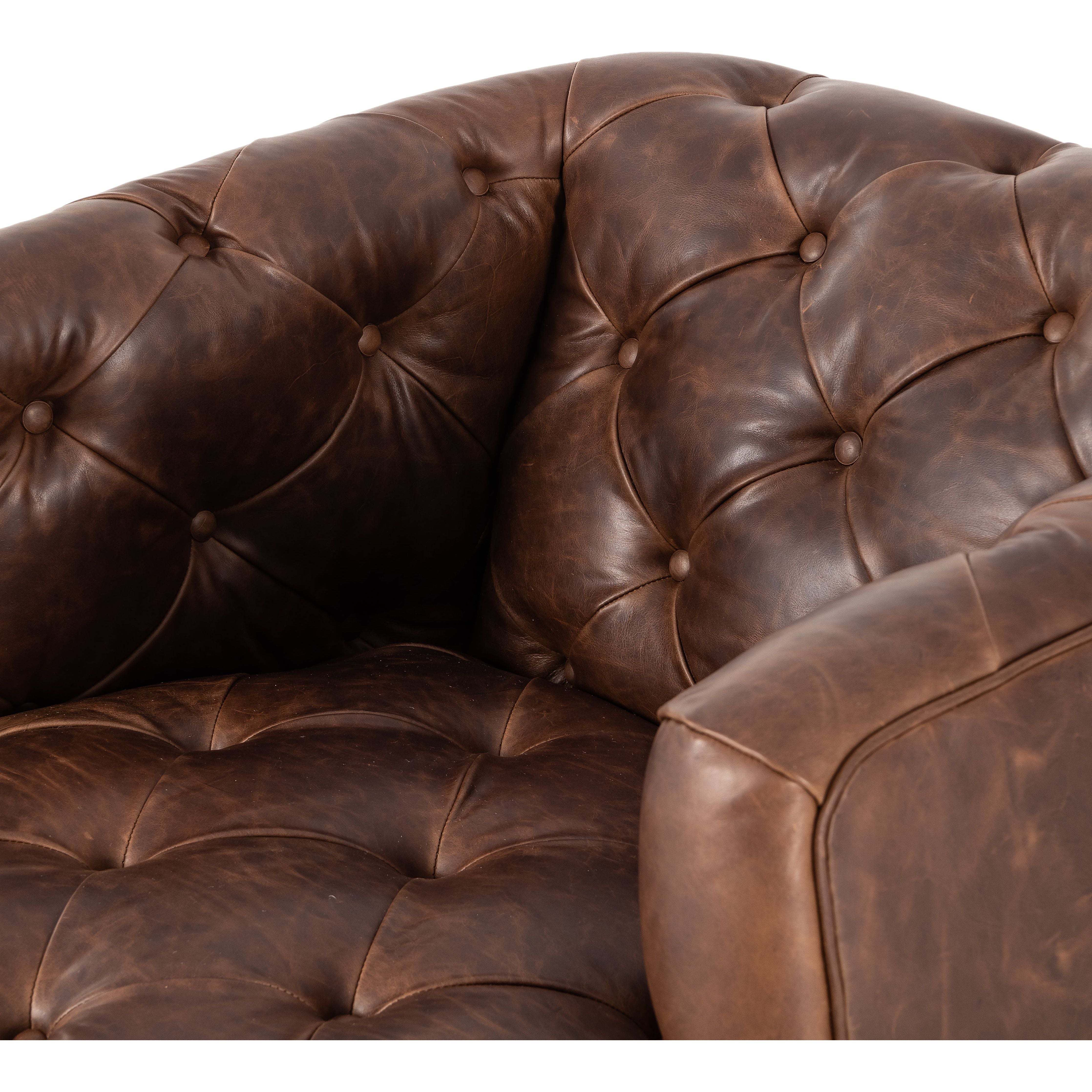 Old English-inspired top-grain leather is finished with a soft hand for a vintage, lived-in look on this traditionally inspired chair. Handcrafted in Italy, the richness of this distinctive, full-bodied leather develops an even-richer patina over time. Button tufting texturizes a comfortably curved back and sides, while a 360-degree swivel modernizes the whole look. Amethyst Home provides interior design, new construction, custom furniture, and area rugs in the Nashville metro area.