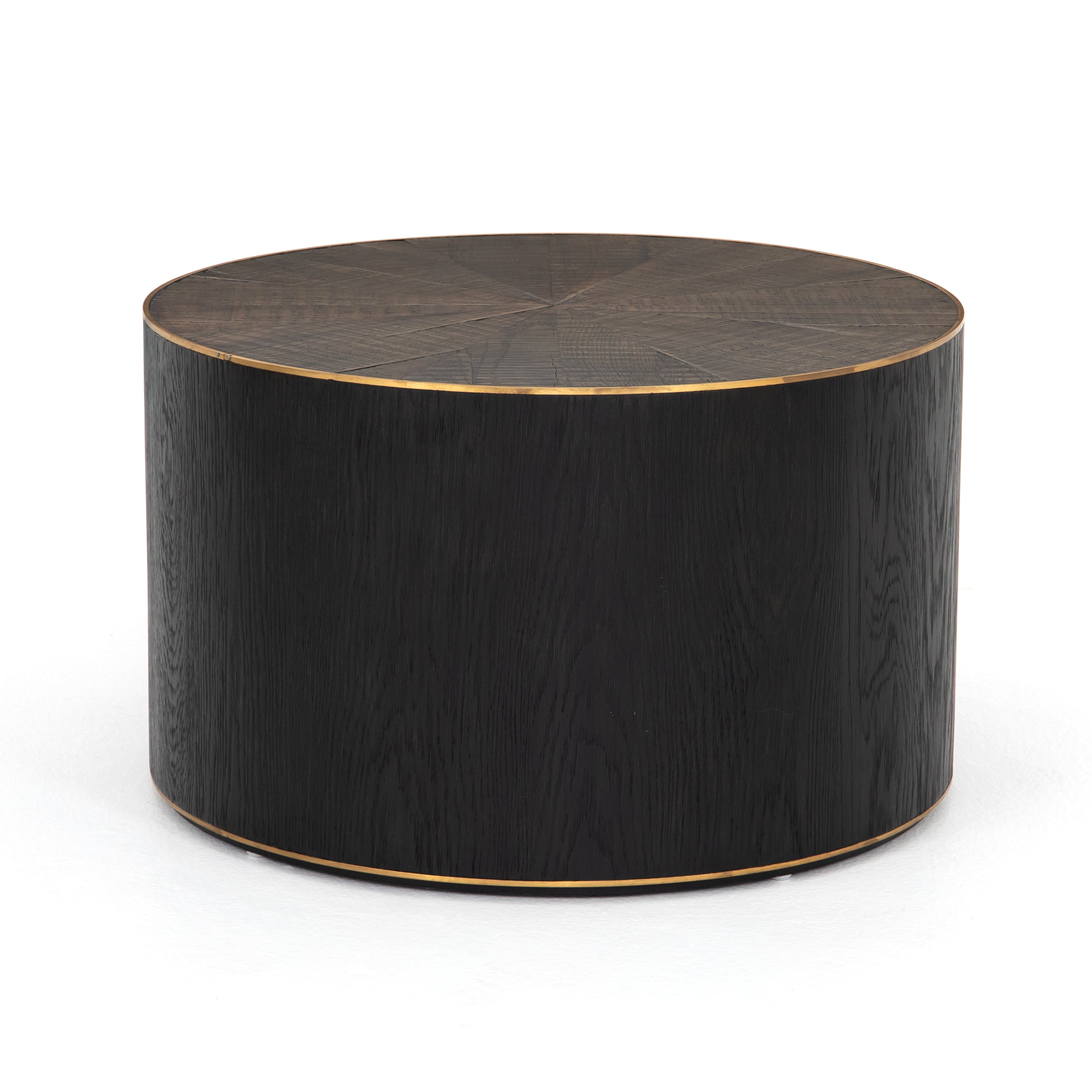 Bring on the drama. An ebony-finished oak top is cut in a starburst texture, framed by deep ebony sides, and encircled by bright brass-clad binding. Amethyst Home provides interior design, new construction, custom furniture, and area rugs in the Washington metro area.
