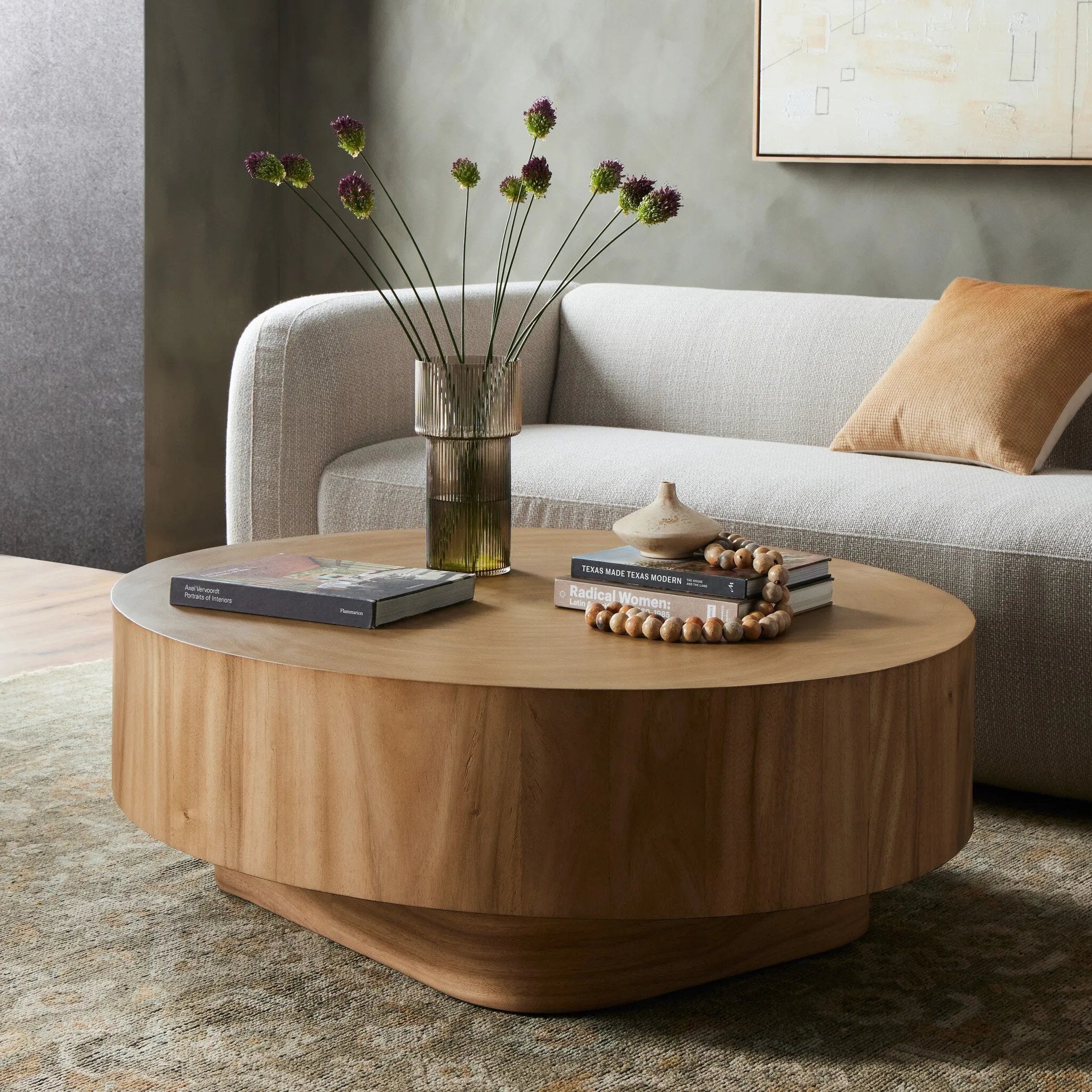 An organically shaped coffee table of Guanacaste features a golden finish with flowing grain and oyster cutting on top.Collection: Wesso Amethyst Home provides interior design, new home construction design consulting, vintage area rugs, and lighting in the Calabasas metro area.