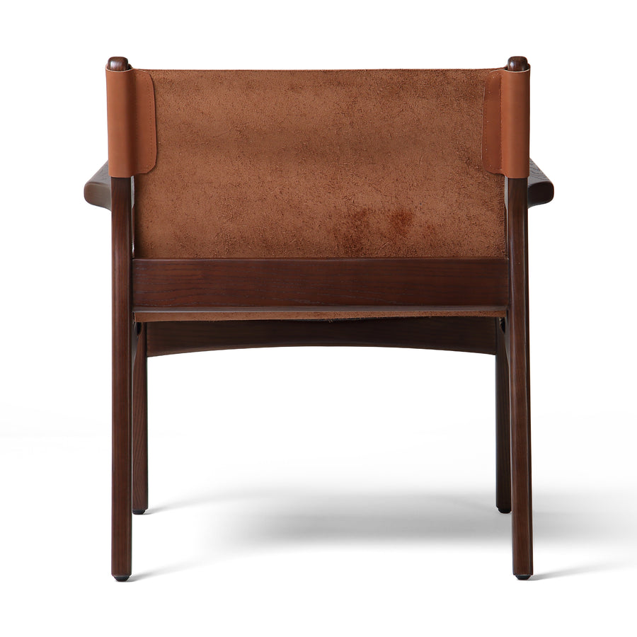 The classic sling chair gets a mid-century modern update. A solid ash frame features subtly curved arms and legs. Sling seating and back are made from 100% top-grain vegetable-tanned leather in a rich chestnut brown. Amethyst Home provides interior design, new construction, custom furniture, and area rugs in the Los Angeles metro area.
