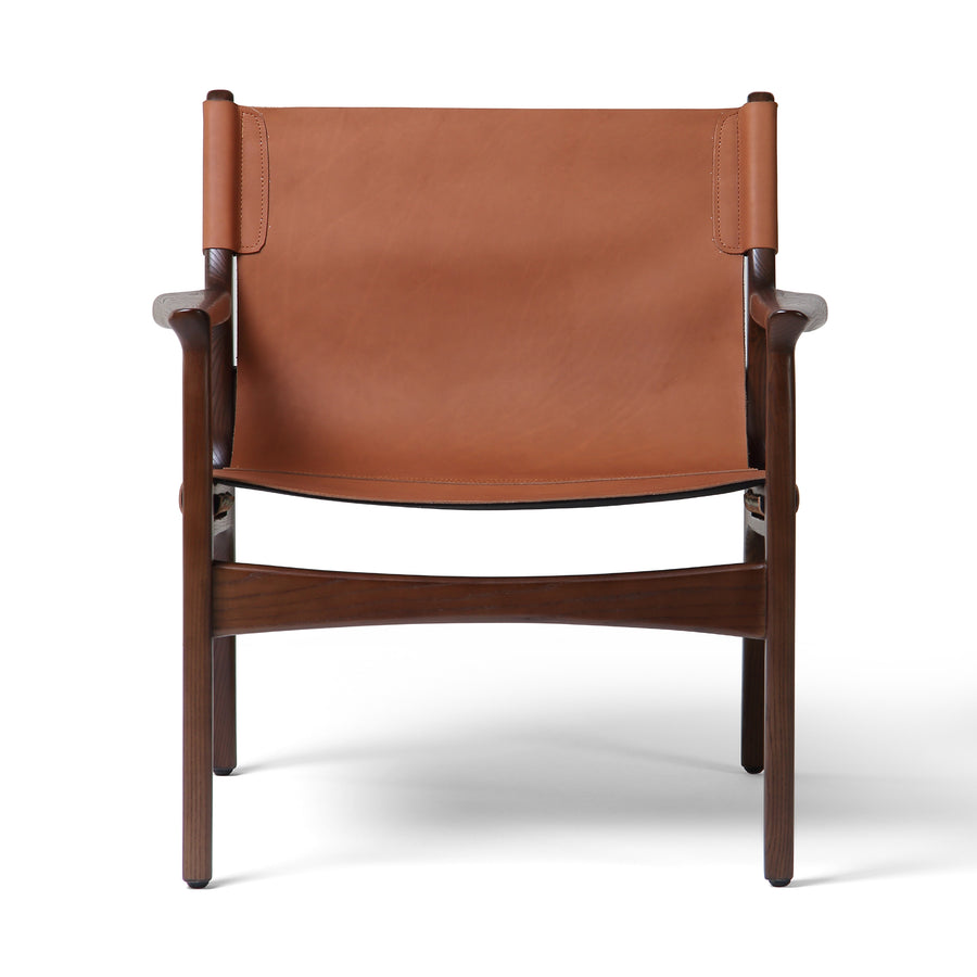 The classic sling chair gets a mid-century modern update. A solid ash frame features subtly curved arms and legs. Sling seating and back are made from 100% top-grain vegetable-tanned leather in a rich chestnut brown. Amethyst Home provides interior design, new construction, custom furniture, and area rugs in the Portland metro area.
