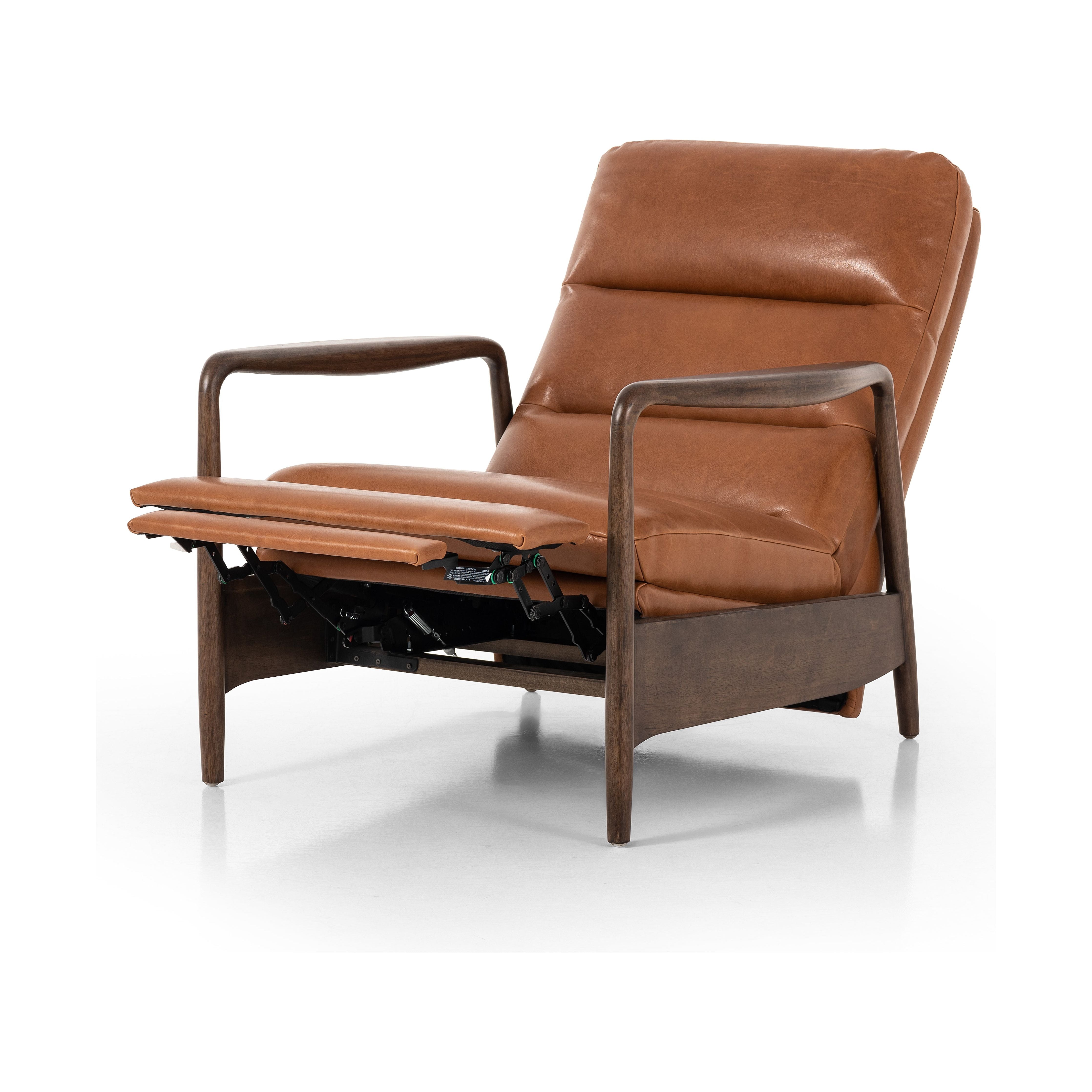 A sleek seat with hidden push-back reclining functionality. This midcentury-inspired recliner features wide chunky channeling paired with slim paddle arms and a tapered wood frame. Designed with a high seat and high back for extra comfy support. Upholstered in a timeless tobacco-hued leather made in a family-owned tannery in Thailand. Amethyst Home provides interior design, new construction, custom furniture, and area rugs in the Kansas City metro area.