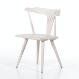 This new take on the mid-century Windsor chair, the Ripley Off White Dining Chair has a bowed, sculptural silhouette. The dining chair is done in an off-white finish to highlight the natural grain of weathered oak. Amethyst Home provides interior design, new construction, custom furniture, and rugs for the Kansas City metro area.
