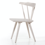 This new take on the mid-century Windsor chair, the Ripley Off White Dining Chair has a bowed, sculptural silhouette. The dining chair is done in an off-white finish to highlight the natural grain of weathered oak. Amethyst Home provides interior design, new construction, custom furniture, and rugs for the Omaha metro area.