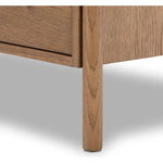 Rounded, chunky dowel legs in an amber oak finish support the overhang top of of this nightstand. Two drawers provide ample storage, finished with simple gunmetal hardware Amethyst Home provides interior design, new home construction design consulting, vintage area rugs, and lighting in the Des Moines metro area.