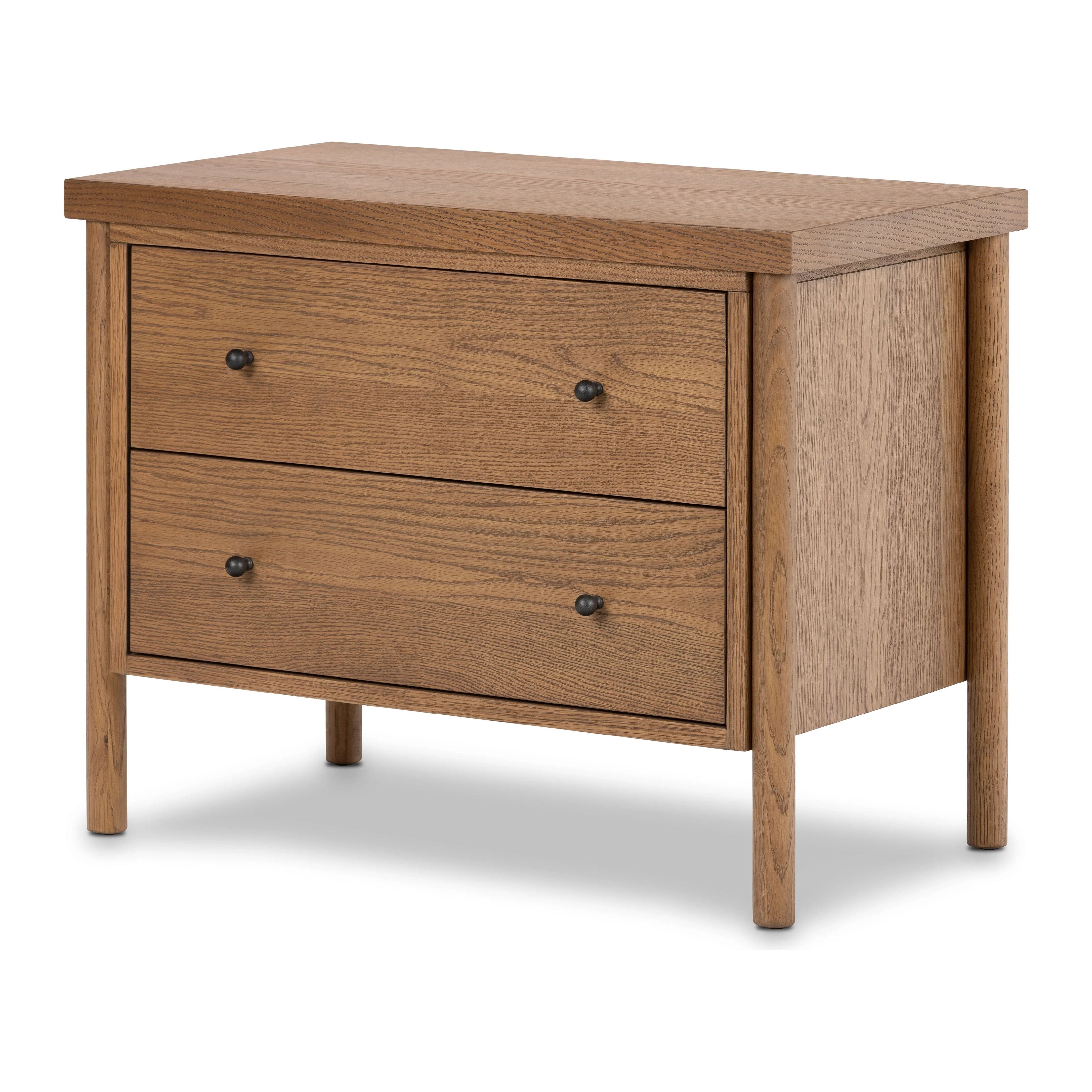 Rounded, chunky dowel legs in an amber oak finish support the overhang top of of this nightstand. Two drawers provide ample storage, finished with simple gunmetal hardware Amethyst Home provides interior design, new home construction design consulting, vintage area rugs, and lighting in the Washington metro area.