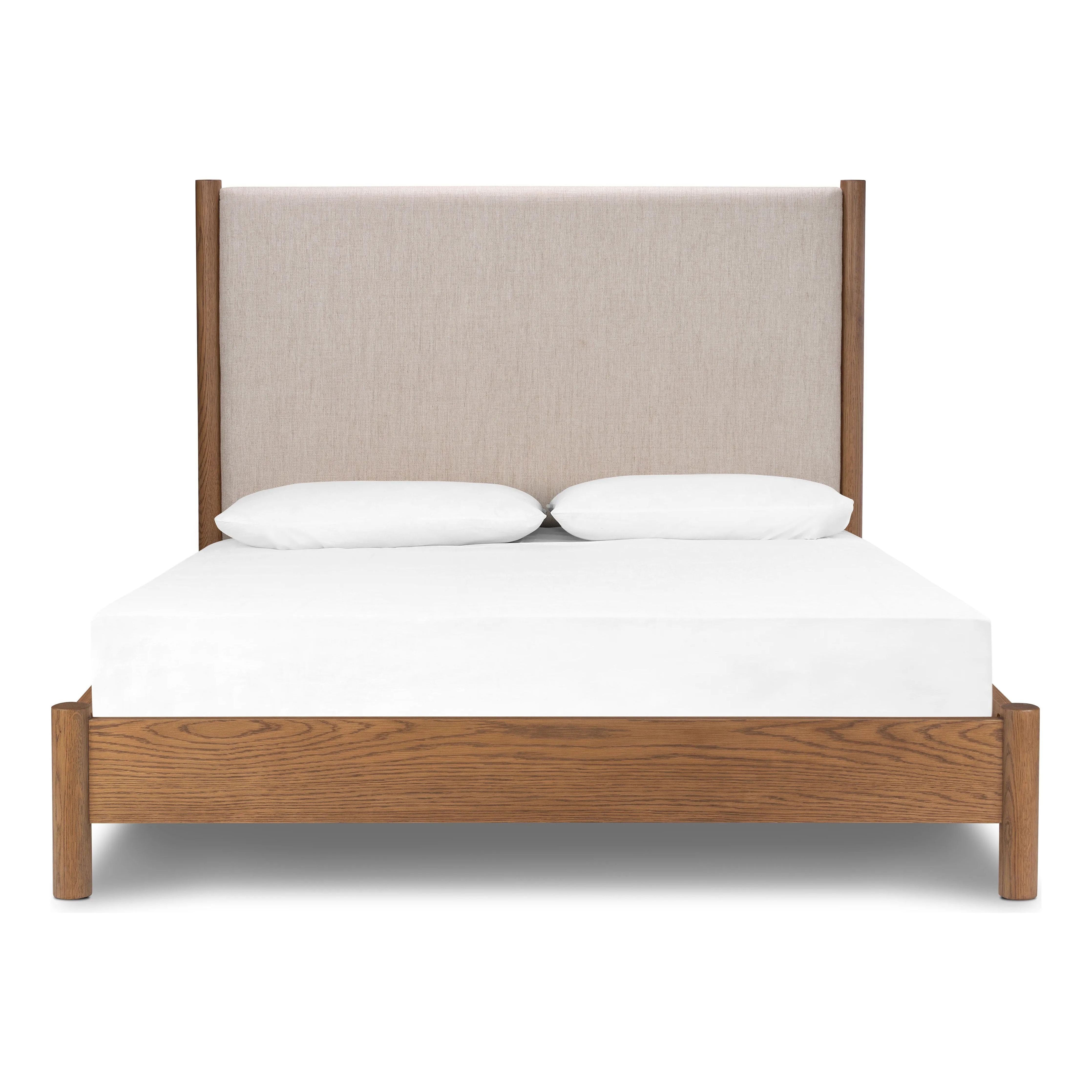 Rounded, chunky dowel legs in an amber oak finish frame the neutral, linen-like upholstered headboard of this bed frame.Collection: Bolto Amethyst Home provides interior design, new home construction design consulting, vintage area rugs, and lighting in the Winter Garden metro area.