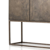 Streamlined and stylish. The Roman Oxidized Iron Bar Cabinet sits atop an airy, geometric frame of bronzed iron. The spacious cabinetry is made from oxidized iron casing with black plywood backing and interior. Amethyst Home provides interior design, new home construction design consulting, vintage area rugs, and lighting in the Boston metro area.