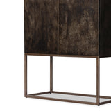Streamlined and stylish. The Roman Oxidized Iron Bar Cabinet sits atop an airy, geometric frame of bronzed iron. The spacious cabinetry is made from oxidized iron casing with black plywood backing and interior. Amethyst Home provides interior design, new home construction design consulting, vintage area rugs, and lighting in the Tampa metro area.
