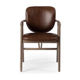 Inspired by Danish midcentury styles, this dining armchair pairs angular framework with soft, rounded seat panels. Seating and arm straps finished in top-grain leather exclusive to Four Hands. Amethyst Home provides interior design, new construction, custom furniture, and area rugs in the Salt Lake City metro area.
