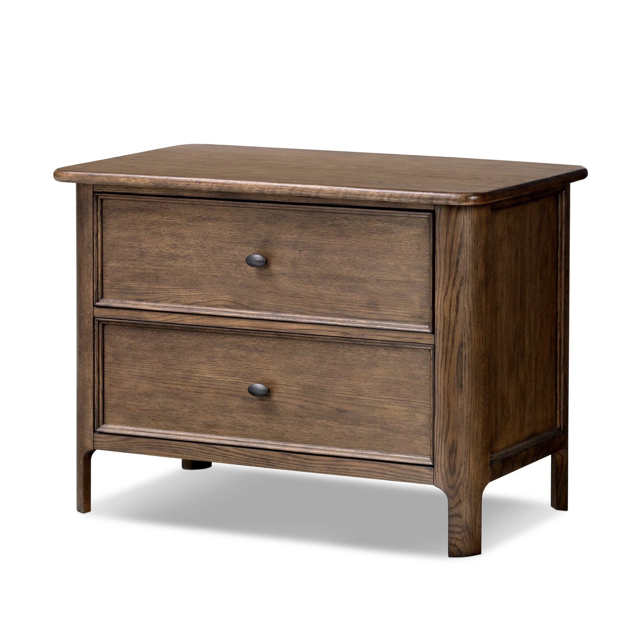 Like an heirloom nightstand with two roomy drawers, this aged oak design has room for it all. Detailed with an overhang surface, carved edges top to bottom, angled legs and oval drawer pulls finished in dark gunmetal.Collection: Bolto Amethyst Home provides interior design, new home construction design consulting, vintage area rugs, and lighting in the Houston metro area.