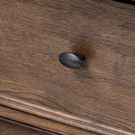 Featuring Russ Aged Oak Nightstand by Four Hands at Amethyst Home. Like an heirloom nightstand with two roomy drawers, this aged oak design has room for it all. Detailed with an overhang surface, carved edges top to bottom, angled legs and oval drawer pulls finished in dark gunmetal.
Collection: BoltonColors: Aged Oak, Aged Oak VeneerMaterials: Solid Oak. Amethyst Home provides interior design, new home construction design consulting, vintage area rugs, and lighting in the Laguna Beach metro area.