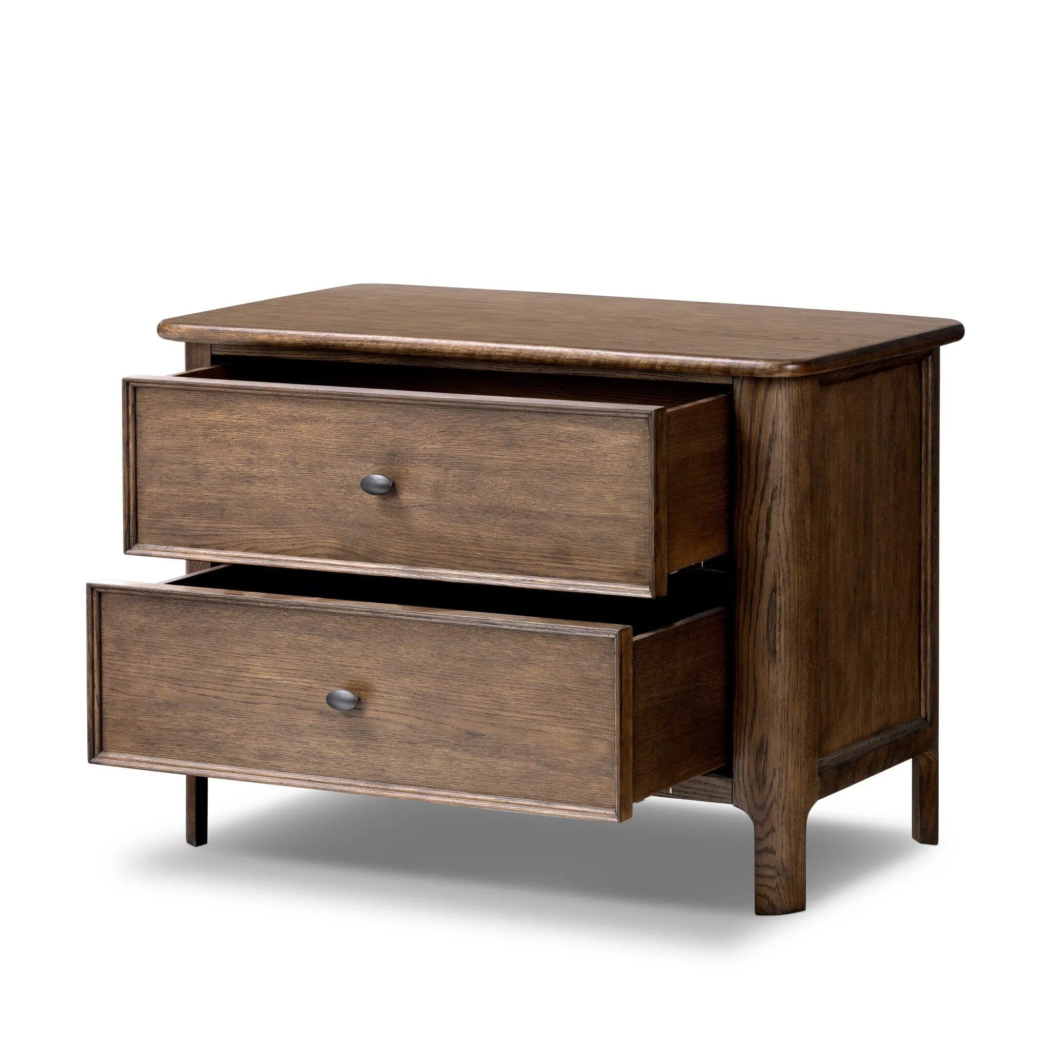Like an heirloom nightstand with two roomy drawers, this aged oak design has room for it all. Detailed with an overhang surface, carved edges top to bottom, angled legs and oval drawer pulls finished in dark gunmetal.Collection: Bolto Amethyst Home provides interior design, new home construction design consulting, vintage area rugs, and lighting in the Park City metro area.