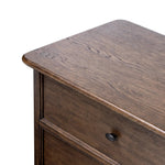 Like an heirloom nightstand with two roomy drawers, this aged oak design has room for it all. Detailed with an overhang surface, carved edges top to bottom, angled legs and oval drawer pulls finished in dark gunmetal.Collection: Bolto Amethyst Home provides interior design, new home construction design consulting, vintage area rugs, and lighting in the Seattle metro area.