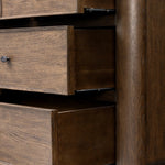 Like an heirloom dresser with three smaller drawers up top, this aged oak design has room for it all. Detailed with an overhang surface, carved edges top to bottom, angled legs and oval drawer pulls finished in dark gunmetal.Collection: Bolto Amethyst Home provides interior design, new home construction design consulting, vintage area rugs, and lighting in the San Diego metro area.