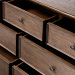 Like an heirloom dresser with three smaller drawers up top, this aged oak design has room for it all. Detailed with an overhang surface, carved edges top to bottom, angled legs and oval drawer pulls finished in dark gunmetal.Collection: Bolto Amethyst Home provides interior design, new home construction design consulting, vintage area rugs, and lighting in the Tampa metro area.