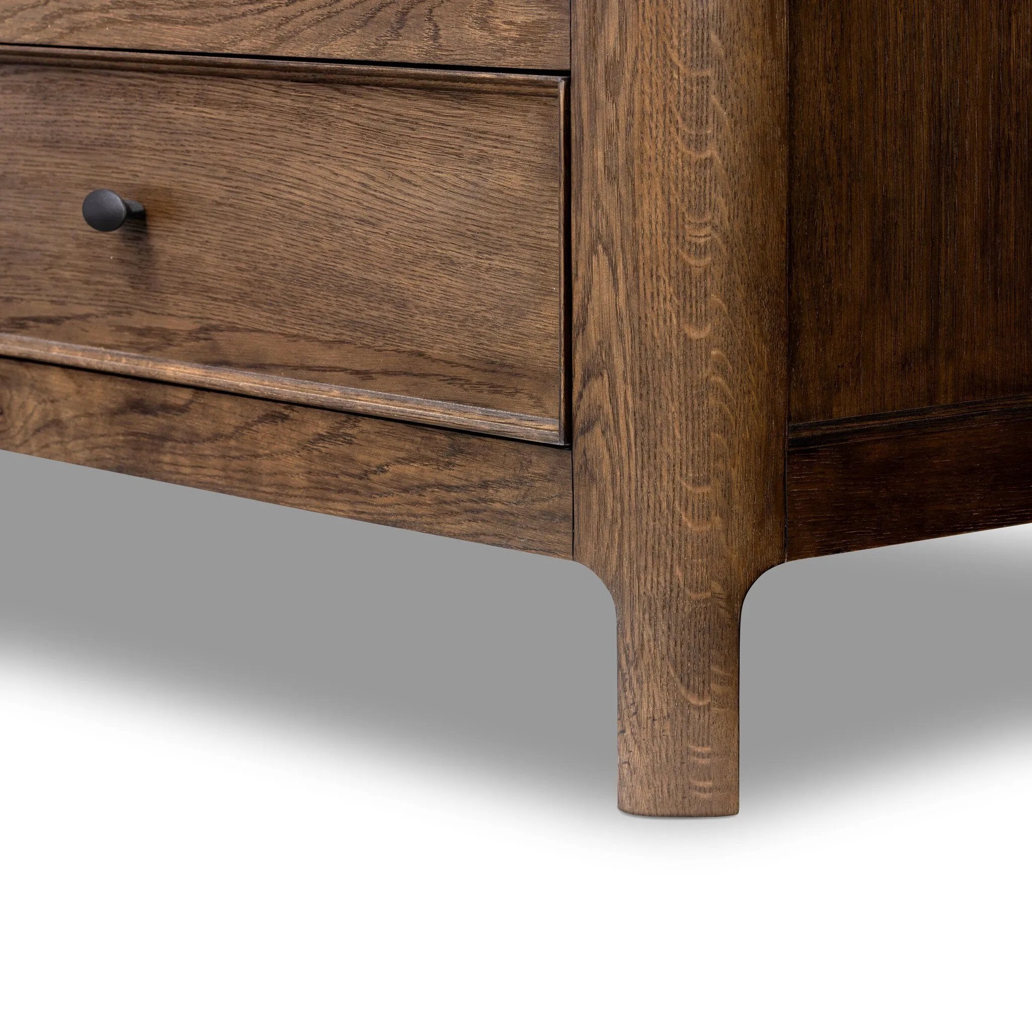 Like an heirloom tallboy with six drawers, this aged oak dresser has room for it all. Detailed with an overhang surface, carved edges top to bottom, angled legs and oval drawer pulls finished in dark gunmetal.Collection: Bolto Amethyst Home provides interior design, new home construction design consulting, vintage area rugs, and lighting in the Des Moines metro area.