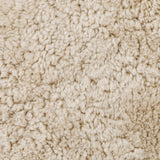Bring a textural touch to the counter with the Saldino stool. Blonde-finished solid parawood supports rounded seating of soft beige shearling for comfort and style alike. Amethyst Home provides interior design, new home construction design consulting, vintage area rugs, and lighting in the Charlotte metro area.