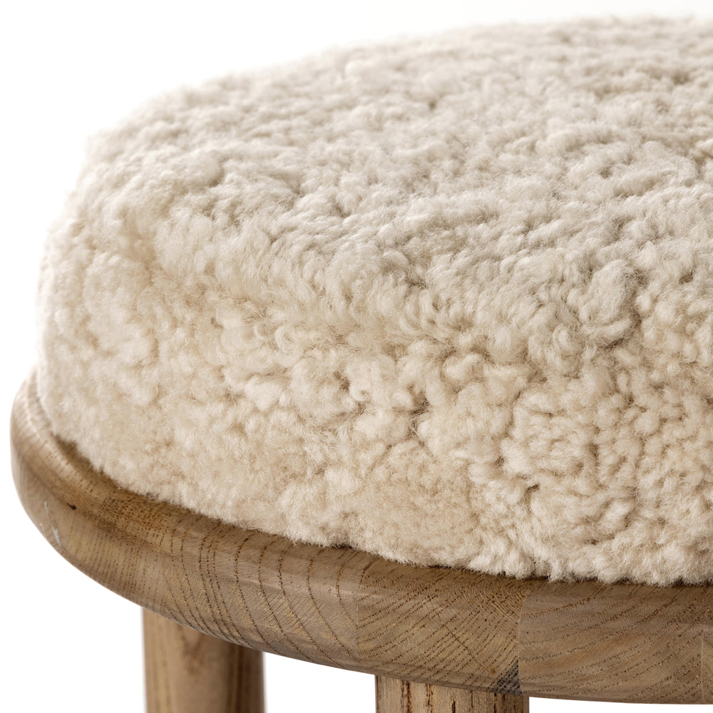 Featuring Saldino Stool by Four Hands at Amethyst Home. Bring a textural touch to the counter with the Saldino stool. Blonde-finished solid parawood supports rounded seating of soft beige shearling for comfort and style alike.
Overall Dimensions: 17"W x 17"L x 26"HColors: Blonde Nettlewood, Beige ShearlingMaterials: Solid Nettlewood, Shearling Weight: 15. Amethyst Home provides interior design, new home construction design consulting, vintage area rugs, and lighting in the Laguna Beach metro area.
