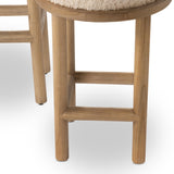 Bring a textural touch to the counter with the Saldino stool. Blonde-finished solid parawood supports rounded seating of soft beige shearling for comfort and style alike. Amethyst Home provides interior design, new home construction design consulting, vintage area rugs, and lighting in the Tampa metro area.
