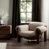 A cozy spot for lounging and curling up with a good book. This statement-making chair features large overflowing cushioning that wraps around the arms and back. Designed with S spring construction and a solid oak frame. Upholstered in a smooth sueded leather with contrasting sling seating strap beneath.Collection: Bin Amethyst Home provides interior design, new home construction design consulting, vintage area rugs, and lighting in the Seattle metro area.