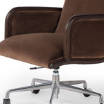 This comfort-driven take on the modern desk chair features velvety cocoa-colored upholstery, pared with a wooden frame. Casters and seat height adjustability for ease as you work. Amethyst Home provides interior design, new construction, custom furniture, and area rugs in the Salt Lake City metro area.