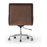 This comfort-driven take on the modern desk chair features velvety cocoa-colored upholstery, pared with a wooden frame. Casters and seat height adjustability for ease as you work. Amethyst Home provides interior design, new construction, custom furniture, and area rugs in the Scottsdale metro area.