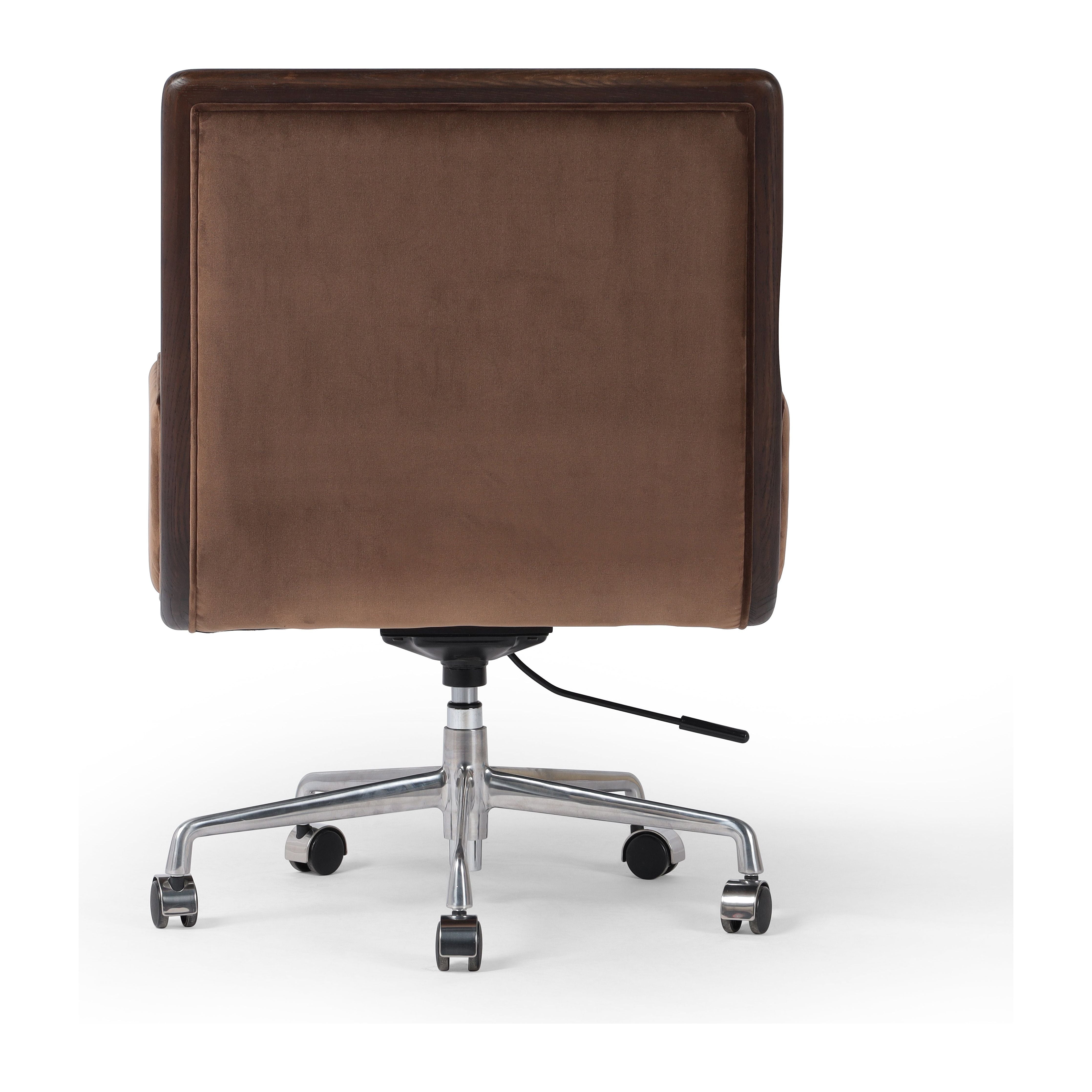 This comfort-driven take on the modern desk chair features velvety cocoa-colored upholstery, pared with a wooden frame. Casters and seat height adjustability for ease as you work. Amethyst Home provides interior design, new construction, custom furniture, and area rugs in the Seattle metro area.