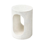 Made from textured white concrete, a cylinder shaped end table features a pill-shaped cutout for a light look. Subtle mottling adds a hint of texture.Collection: Chandle Amethyst Home provides interior design, new home construction design consulting, vintage area rugs, and lighting in the Des Moines metro area.