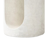 Made from textured white concrete, a cylinder shaped end table features a pill-shaped cutout for a light look. Subtle mottling adds a hint of texture.Collection: Chandle Amethyst Home provides interior design, new home construction design consulting, vintage area rugs, and lighting in the Park City metro area.