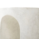 Made from textured white concrete, a cylinder shaped end table features a pill-shaped cutout for a light look. Subtle mottling adds a hint of texture.Collection: Chandle Amethyst Home provides interior design, new home construction design consulting, vintage area rugs, and lighting in the San Diego metro area.