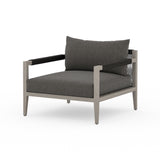 Featuring Sherwood Grey/Charcoal Outdoor Chair by Four Hands at Amethyst Home. Modern materials ready a stylish silhouette for the outdoors. Weathered grey teak forms a clean frame for UV-resistant and water-repellent Sunproof fabric. Cover or store indoors during inclement weather.Overall Dimensions: 33"W x 34.25"L x 30"H
Collection: SolanoColors: Venao Charcoal ,Weathered Grey-Fsc . Amethyst Home provides interior design, new construction, custom furniture, and area rugs in the Omaha metro area.