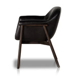 Inspired by traditional Scandinavian styling, the Sora Black Dining Armchair is defined by clean lines and light woods with naturally beautiful graining patterns, while contemporary touches like color pops, metal finishes and leather detailing add fresh-feeling contrast. Amethyst Home provides interior design services, furniture, rugs, and lighting in the Dallas metro area.