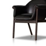 Inspired by traditional Scandinavian styling, the Sora Black Dining Armchair is defined by clean lines and light woods with naturally beautiful graining patterns, while contemporary touches like color pops, metal finishes and leather detailing add fresh-feeling contrast. Amethyst Home provides interior design services, furniture, rugs, and lighting in the Omaha metro area.
