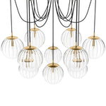 Clear glass spheres float at varying lengths for a statement-making piece. Each globe is individually blown, shaped and sculpted by hand through a one-hour process. Brass and glass are 98% recyclable. Designed and sustainably crafted in Poland by Schwung.Overall Dimensions62.50"w x 62.50"d x 52.75"hFull Details &amp; SpecificationsTear Shee Amethyst Home provides interior design, new home construction design consulting, vintage area rugs, and lighting in the Winter Garden metro area.