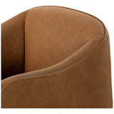 Shape-driven and sustainably made, this modern accent chair is upholstered in carbon neutral, vegetable-tanned leather processed using naturally fallen eucalyptus leaves in Uruguay. S-spring construction ensures a supportive sit, while side cutouts catch the eye. Amethyst Home provides interior design, new construction, custom furniture, and area rugs in the Houston metro area.