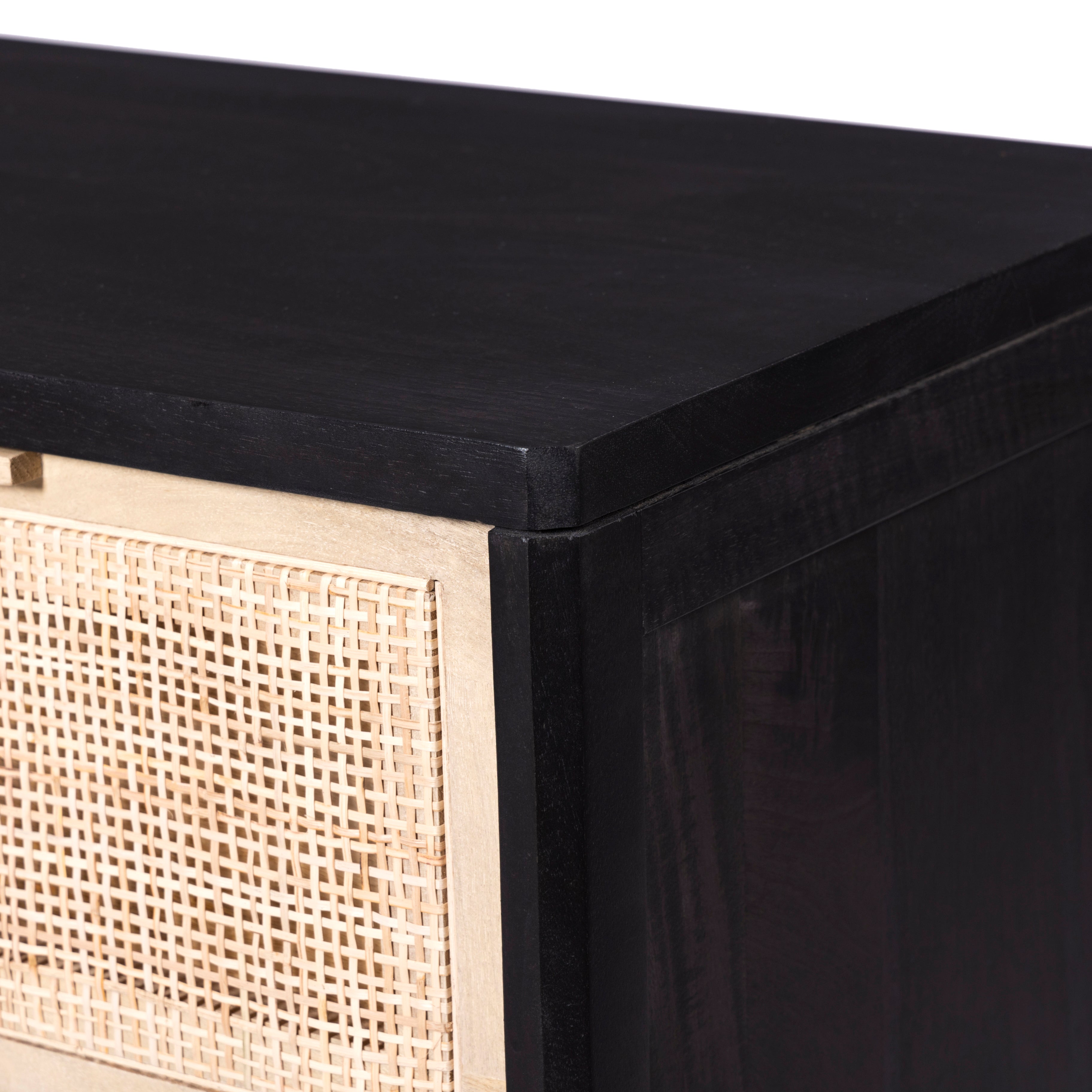 Natural mango encases nine spacious drawers of woven cane, for a textural look with eye-catching contrast. Amethyst Home provides interior design, new construction, custom furniture, and area rugs in the Houston metro area.