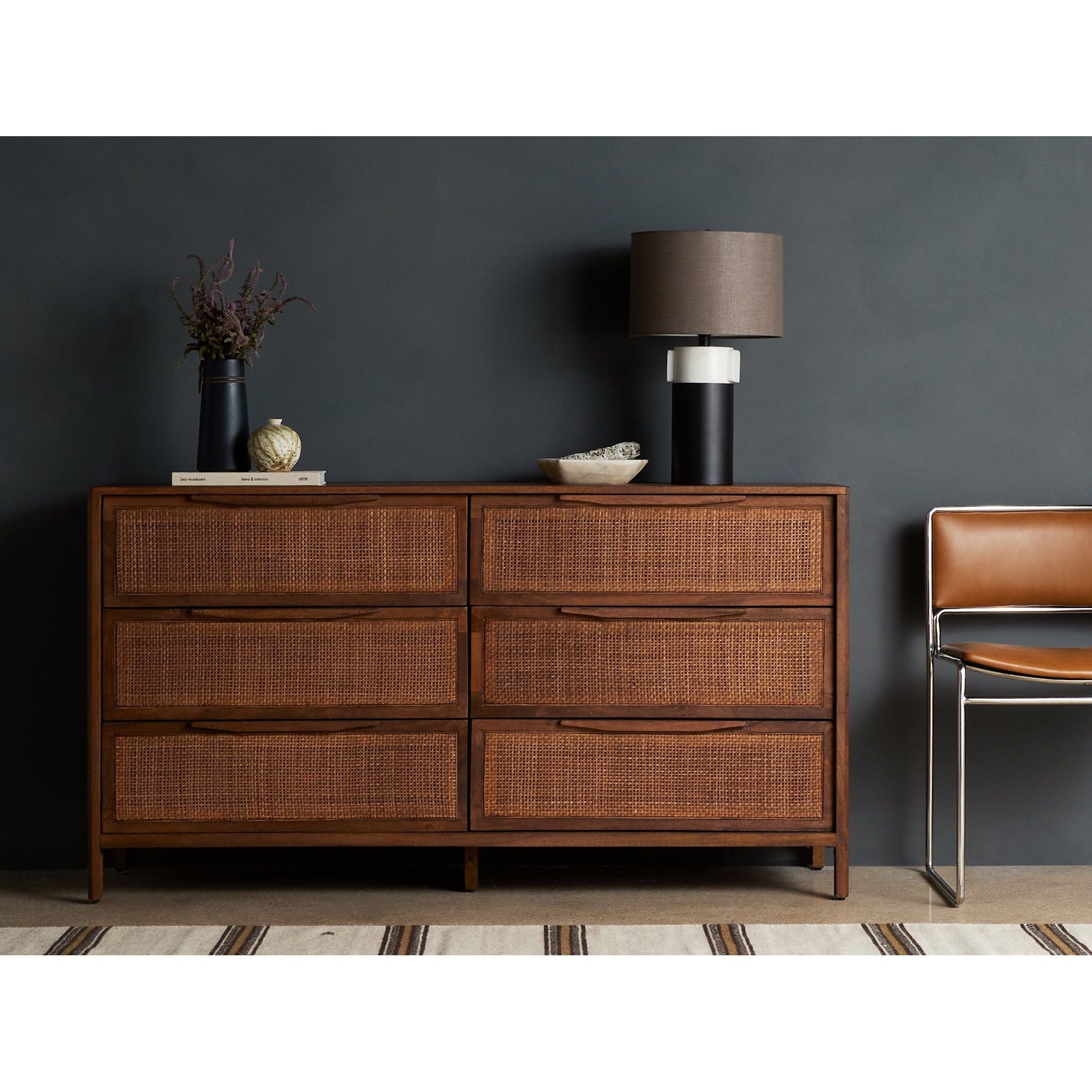 Sydney Brown Wash Drawer Dresser encases six spacious drawers of woven cane, for a textural look with monochromatic vibes. Amethyst Home provides interior design services, furniture, rugs, and lighting in the Monterey metro area.