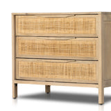 Natural mango frames inset woven cane, for a light, textural look with organic allure. Three spacious drawers provide plenty of closed storage. Amethyst Home provides interior design, new home construction design consulting, vintage area rugs, and lighting in the Miami metro area.