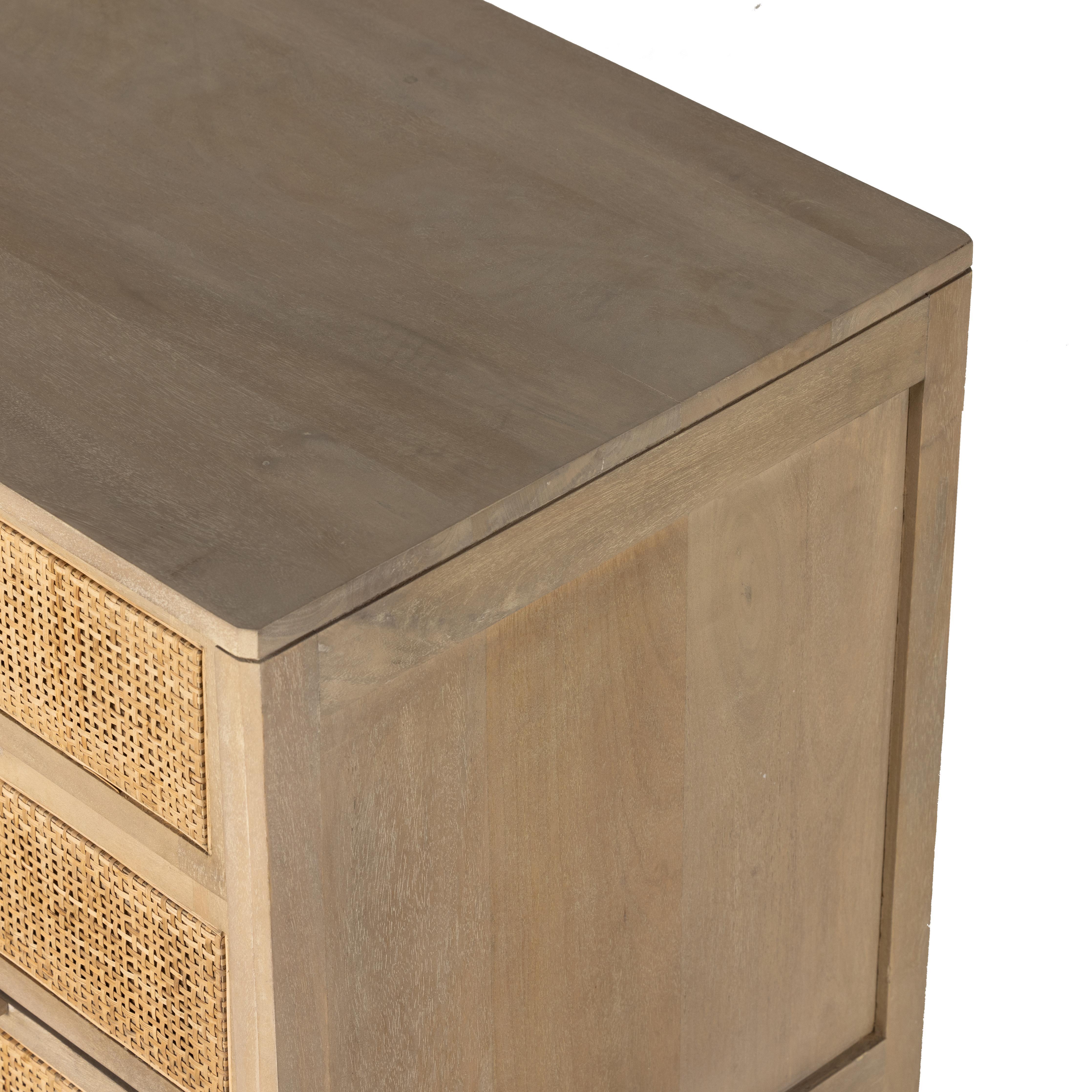 Natural mango frames inset woven cane, for a light, textural look with organic allure. Three spacious drawers provide plenty of closed storage. Amethyst Home provides interior design, new home construction design consulting, vintage area rugs, and lighting in the Monterey metro area.