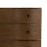 Made from solid oak and finished in a toasted oak, this three-drawer nightstand is inspired by European antiques to bring both style and storage space to the bedroom.Collection: Collins Amethyst Home provides interior design, new home construction design consulting, vintage area rugs, and lighting in the Charlotte metro area.