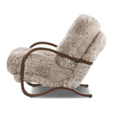 Ethically sourced authentic Mongolian sheepskin covers this unique statement chair, featuring removable feather-foam cushions. A cantilever-like wooden frame pairs with a webbed suspension seat to offer a true sink-in sit Amethyst Home provides interior design, new home construction design consulting, vintage area rugs, and lighting in the Portland metro area.