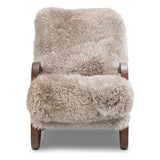 Ethically sourced authentic Mongolian sheepskin covers this unique statement chair, featuring removable feather-foam cushions. A cantilever-like wooden frame pairs with a webbed suspension seat to offer a true sink-in sit Amethyst Home provides interior design, new home construction design consulting, vintage area rugs, and lighting in the Winter Garden metro area.