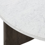 Mixed materials make the table. Thick-cut oak forms a chunky pedestal base for a rounded tabletop of white Italian marble, with beautifully subtle natural veining. Designed in partnership with longtime Four Hands collaborator Thomas Bina and Brazilian designer Ronald Sasson Amethyst Home provides interior design, new home construction design consulting, vintage area rugs, and lighting in the Laguna Beach metro area.