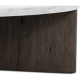 Mixed materials make the table. Thick-cut oak forms a chunky pedestal base for a rounded tabletop of white Italian marble, with beautifully subtle natural veining. Designed in partnership with longtime Four Hands collaborator Thomas Bina and Brazilian designer Ronald Sasson Amethyst Home provides interior design, new home construction design consulting, vintage area rugs, and lighting in the Nashville metro area.