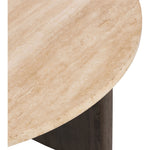 Mixed materials make the table. Thick-cut oak forms a chunky pedestal base for a rounded tabletop of light travertine, with subtle natural veining. Designed in partnership with longtime Four Hands collaborator Thomas Bina and Brazilian designer Ronald Sasson Amethyst Home provides interior design, new home construction design consulting, vintage area rugs, and lighting in the Austin metro area.